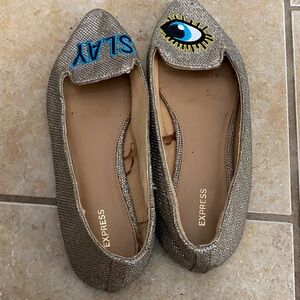 Express Metallic Gold Flats with Eye and SLAY Design